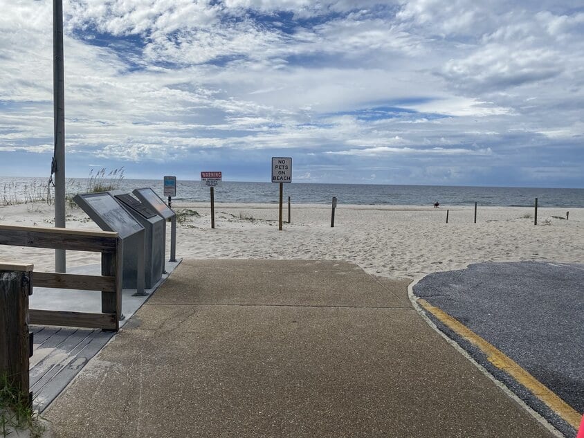 View of beach and ocean from parking lot